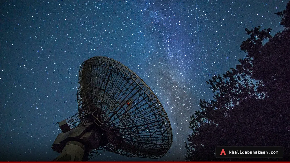 White satellite dish under blue sky during night time. Photo by Stephan Widua on Unsplash.